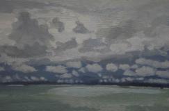 Seascape with clouds on the horizon