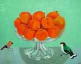 Tangerines and two wooden birds